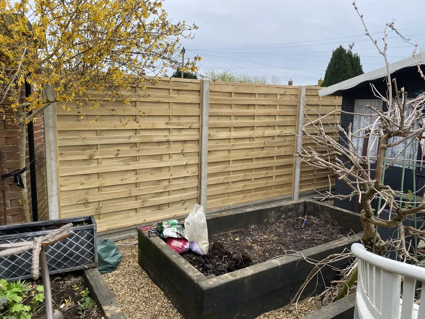 Completed garden fencing project on a rear boundary