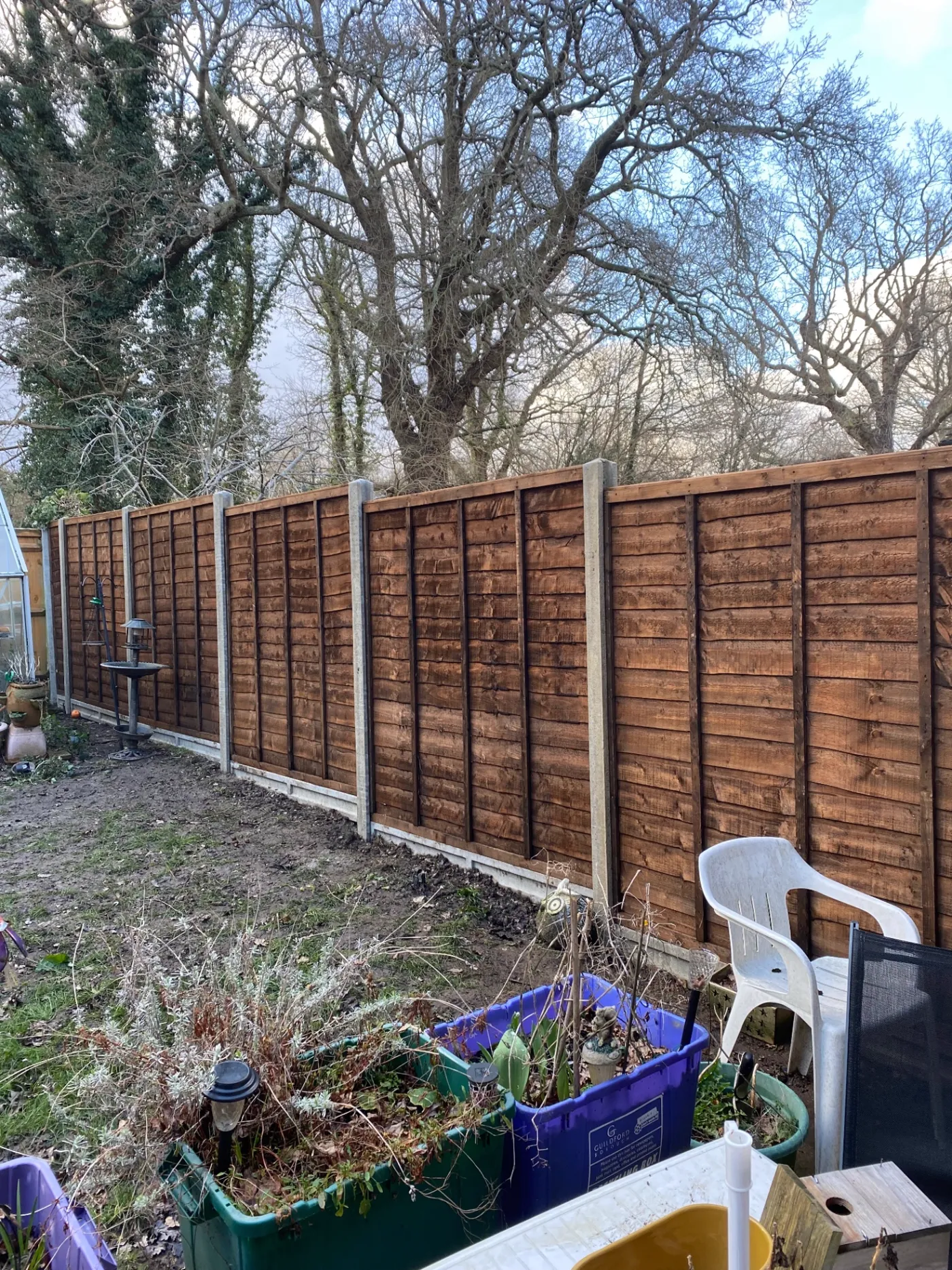 Lap garden fence panels replaced behind a back garden