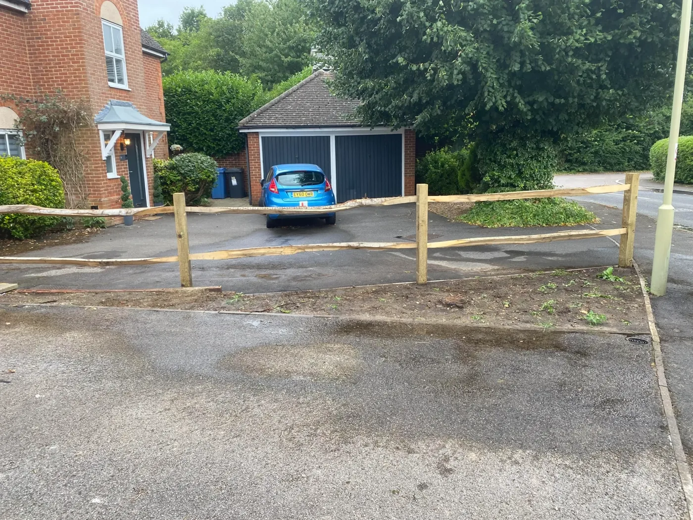 Fence installation project on a residential boundary